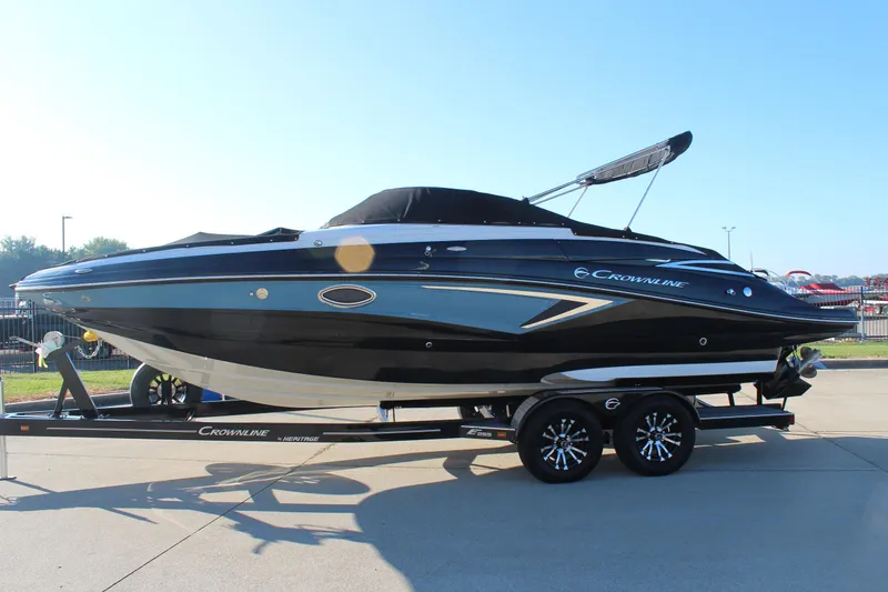 Slide: The Image of 2024 Crownline Eclipse E255 boat interior with sleek seating and modern design. - 28