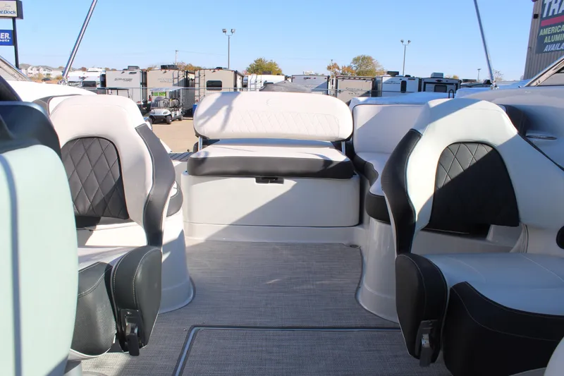 Slide: The Image of 2024 Crownline Eclipse E255 boat interior with stylish seating and modern design. - 38