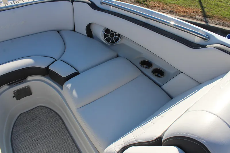 Slide: The Image of 2024 Crownline Eclipse E255 boat interior with stylish seating and modern design. - 7