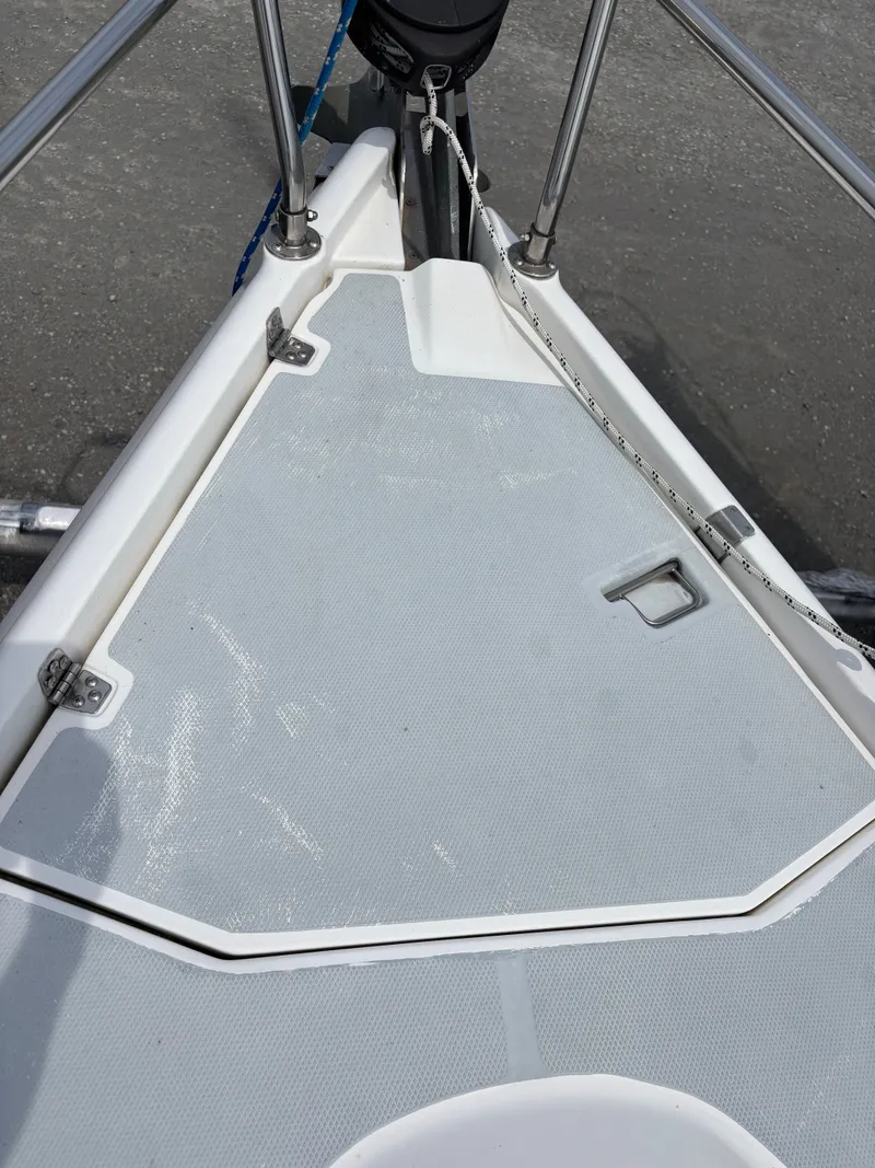Slide: The Image of Bow deck of a 2001 Hunter 320 sailboat with anchor and fittings. - 17
