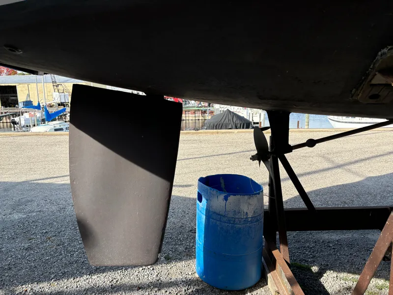 Slide: The Image of Bottom view of a 2001 Hunter 320 sailboat with rudder and propeller. - 9