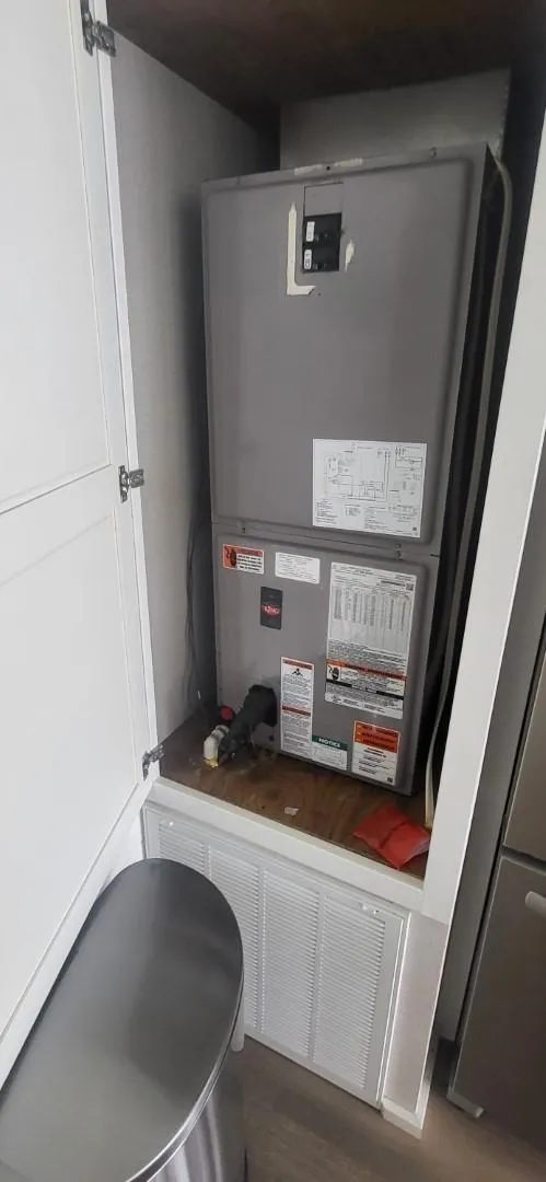 Slide: The Image of 2020 Destination Yachts 16x45 Condo Series HVAC unit in cabinet. - 11