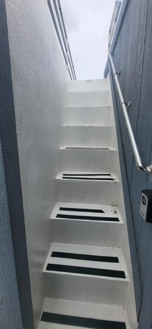 Slide: The Image of White staircase on 2020 Destination Yachts 16x45 Condo Series boat. - 21