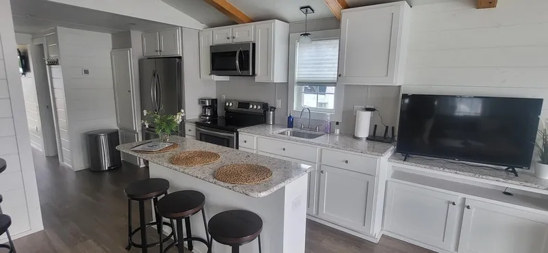 Slide: The Image of Modern kitchen interior in 2020 Destination Yachts 16x45 Condo Series houseboat. - 8