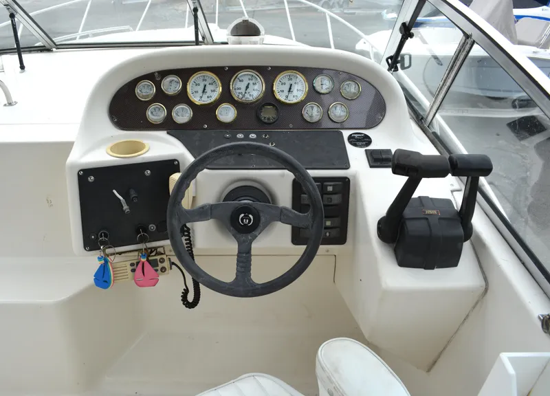 Slide: The Image of 1998 Monterey 296 Cruiser dashboard with steering wheel and instrument panel. - 5