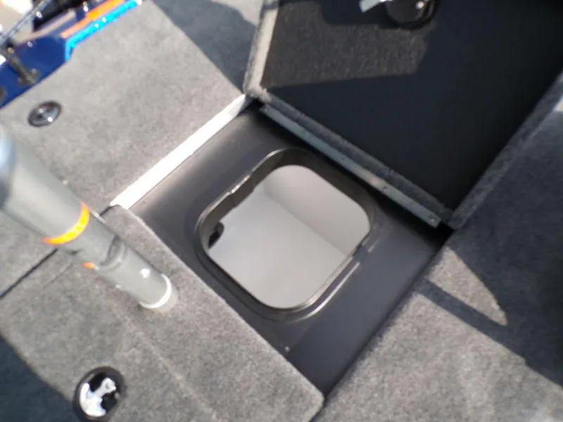 Slide: The Image of Open storage compartment on 2025 Skeeter ZXR20 boat deck. - 27