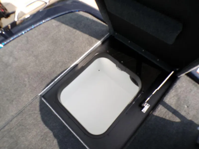 Slide: The Image of Open storage compartment on 2025 Skeeter ZXR20 boat deck. - 28