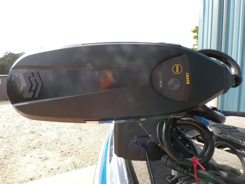 Slide: The Image of 2025 Skeeter ZXR20 boat motor, close-up view with cables and controls. - 9