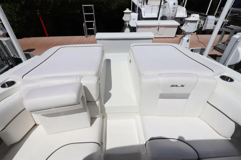Slide: The Image of Interior of a 2009 Sea Ray 270 Select EX boat with white seating. - 11