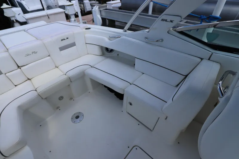 Slide: The Image of Interior of a 2009 Sea Ray 270 Select EX boat with white seating. - 13