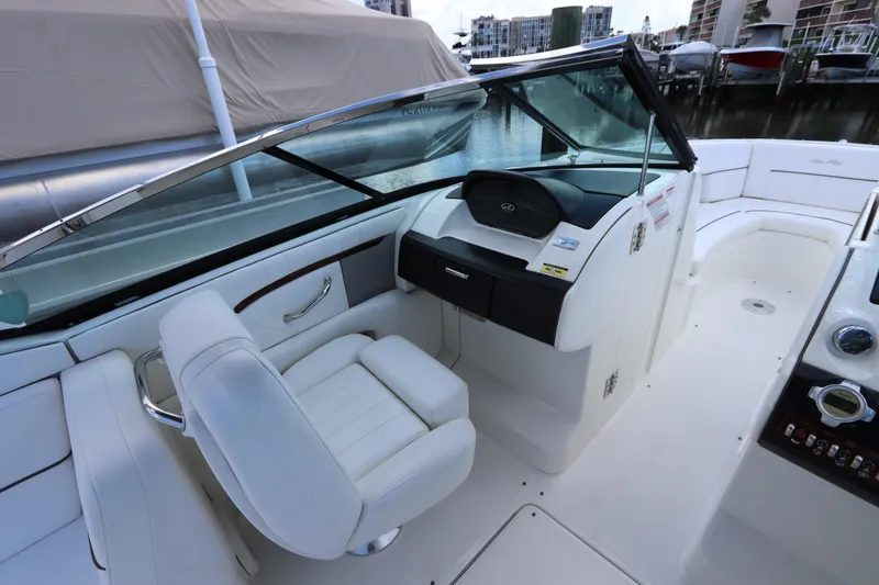 Slide: The Image of Interior of a 2009 Sea Ray 270 Select EX boat, helm and seating area. - 18