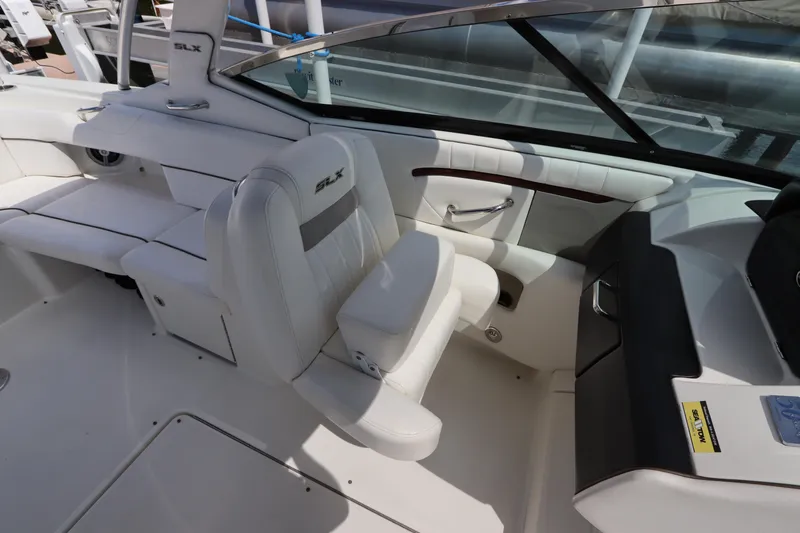 Slide: The Image of Interior of a 2009 Sea Ray 270 Select EX boat, white leather seating. - 19