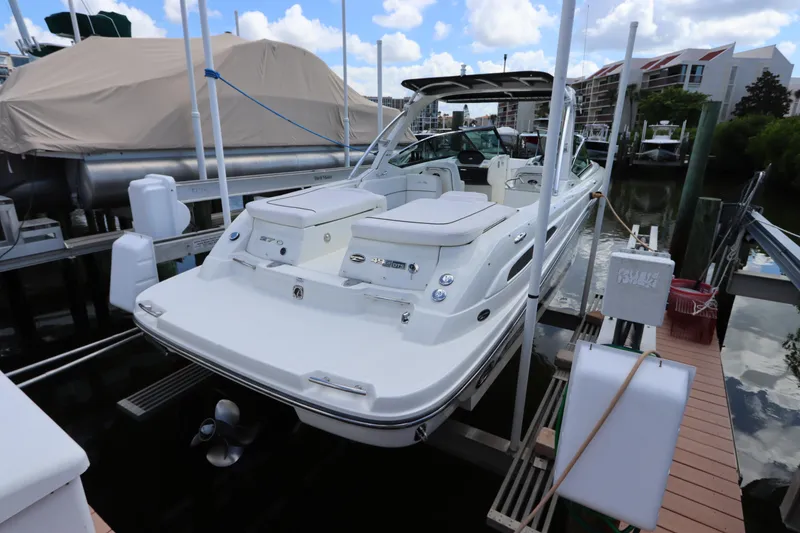 Slide: The Image of 2009 Sea Ray 270 Select EX boat at dock. - 2