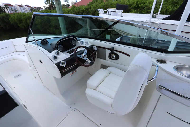 Slide: The Image of Interior of a 2009 Sea Ray 270 Select EX boat with helm console. - 22