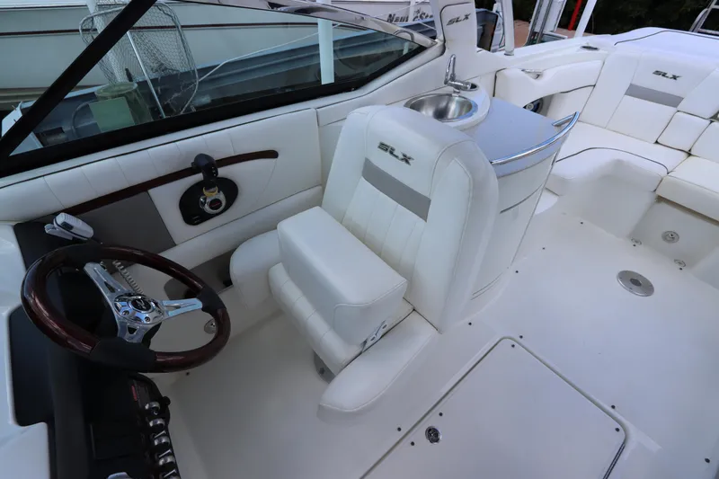 Slide: The Image of Interior of a 2009 Sea Ray 270 Select EX boat with white seating. - 23