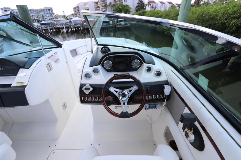 Slide: The Image of Interior view of a 2009 Sea Ray 270 Select EX boat cockpit. - 24