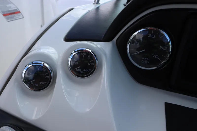 Slide: The Image of Dashboard of 2009 Sea Ray 270 Select EX with gauges. - 27