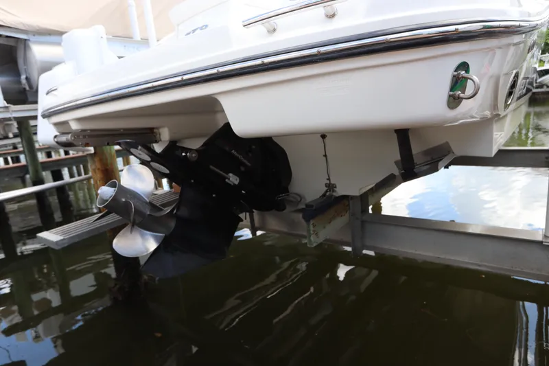 Slide: The Image of Rear view of a 2009 Sea Ray 270 Select EX boat on a lift. - 3