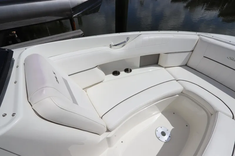 Slide: The Image of Interior of a 2009 Sea Ray 270 Select EX boat with white seating. - 33