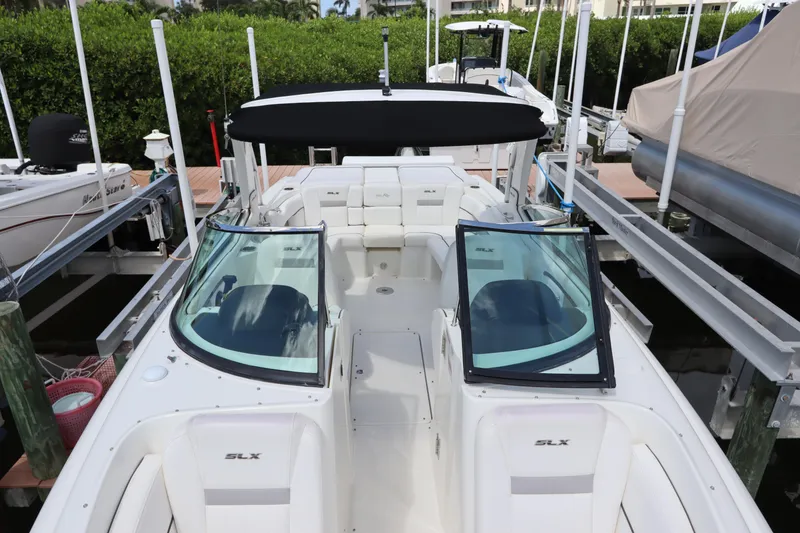 Slide: The Image of 2009 Sea Ray 270 Select EX boat docked at marina. - 36