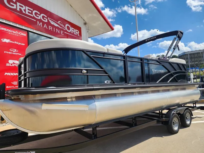 Slide: The Image of 2024 Sylvan Mirage X3 pontoon boat at Gregg Orr Marine dealership. - 23