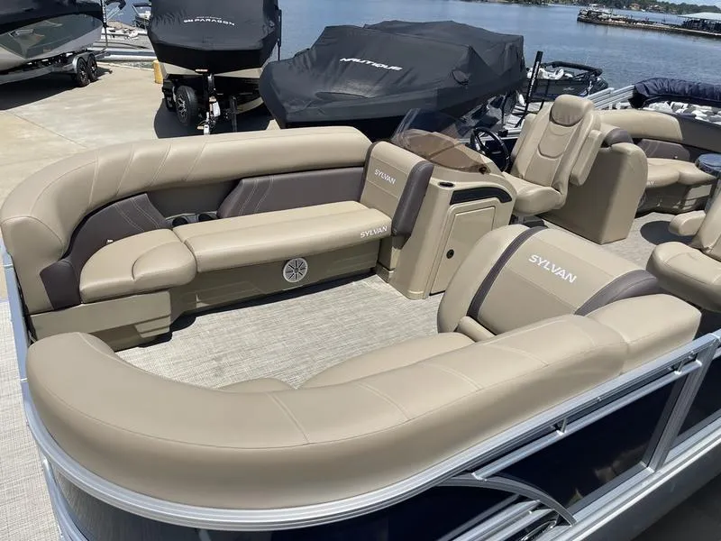 Slide: The Image of 2024 Sylvan Mirage 8524 LZ pontoon boat with luxurious seating and modern design. - 10