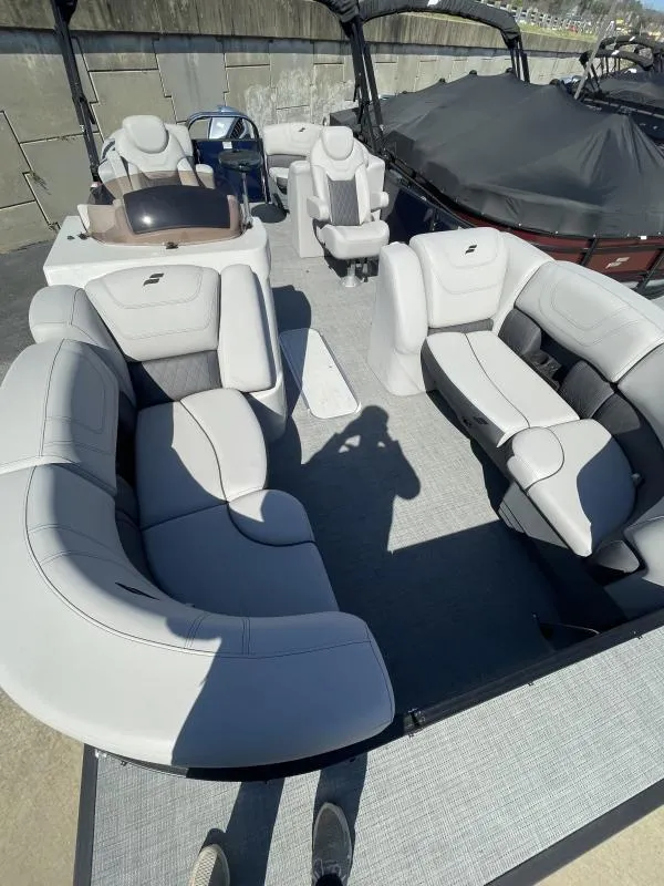 Slide: The Image of 2024 Starcraft SLS-3 pontoon boat with spacious seating and modern design. - 5