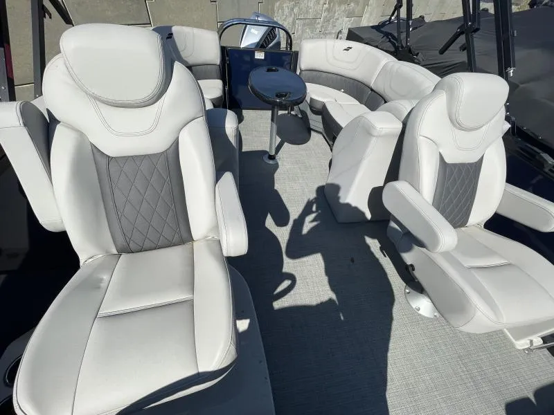 Slide: The Image of 2024 Starcraft SLS-3 boat interior with luxurious seating and table. - 9