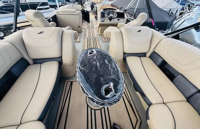 Slide: The Image of 2024 Starcraft SLS-3 boat interior with luxurious seating and sleek design. - 15