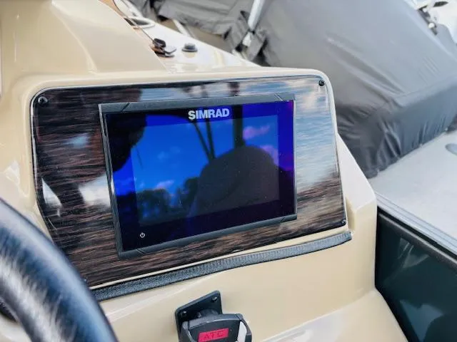 Slide: The Image of Simrad display on 2024 Starcraft SLS-3 boat dashboard. - 20
