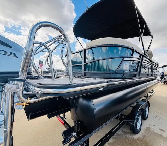 Slide: The Image of 2024 Starcraft SLS-3 pontoon boat on trailer, featuring sleek design and sturdy construction. - 8