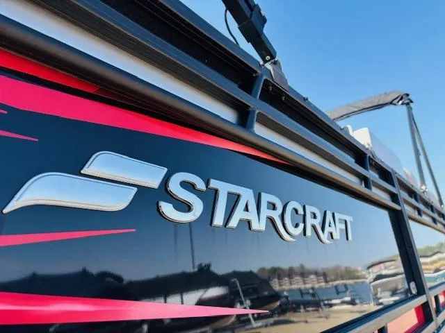 Slide: The Image of 2023 Starcraft SLS-5 Q DH boat with sleek design and logo detail. - 17