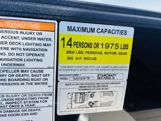 Slide: The Image of 2023 Starcraft SLS-5 Q DH boat capacity label: 14 persons, 1975 lbs, 300 HP motor. - 22