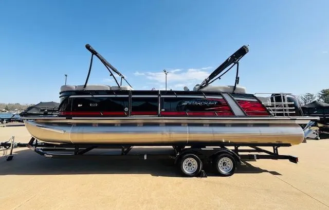 Slide: The Image of 2023 Starcraft SLS-5 Q DH pontoon boat on trailer under clear blue sky. - 4
