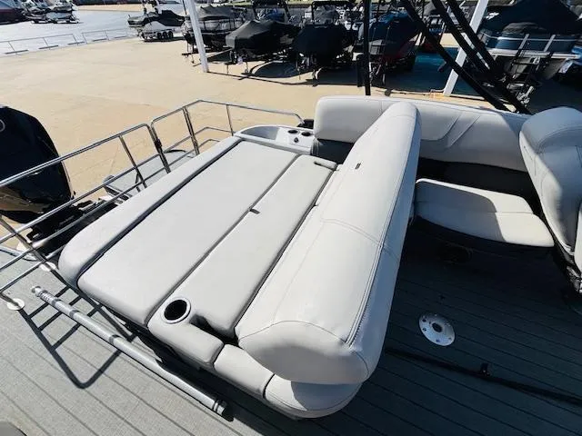 Slide: The Image of 2023 Starcraft SLS-5 Q DH boat with spacious seating and cup holders on deck. - 8