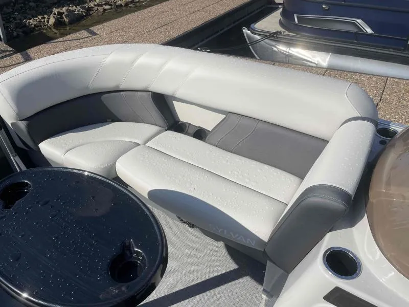 Slide: The Image of Luxurious seating on 2024 Sylvan MIRAGE 822 CLZ DH pontoon boat, featuring sleek design and comfort. - 10