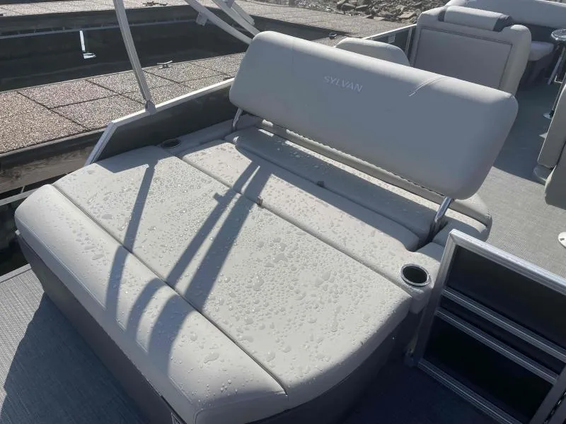 Slide: The Image of 2024 Sylvan MIRAGE 822 CLZ DH boat with wet seating area and cup holders. - 15