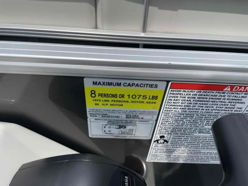 Slide: The Image of 2024 Sylvan Mirage 818 Fish capacity label, 8 persons or 1075 lbs, safety warnings visible. - 15