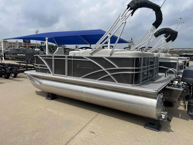 Slide: The Image of 2024 Sylvan Mirage 818 Fish pontoon boat displayed outdoors. - 3