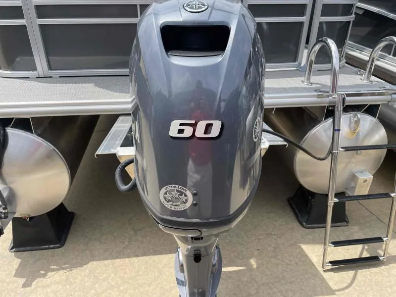 Slide: The Image of 2024 Sylvan Mirage 818 Fish with Yamaha 60HP outboard motor, rear view. - 4