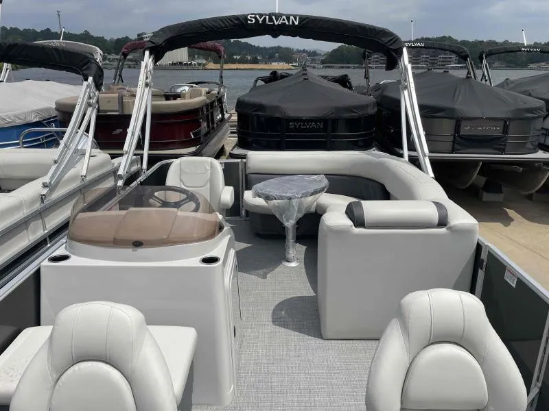 Slide: The Image of 2024 Sylvan Mirage 818 Fish pontoon boat with spacious seating and modern design. - 5