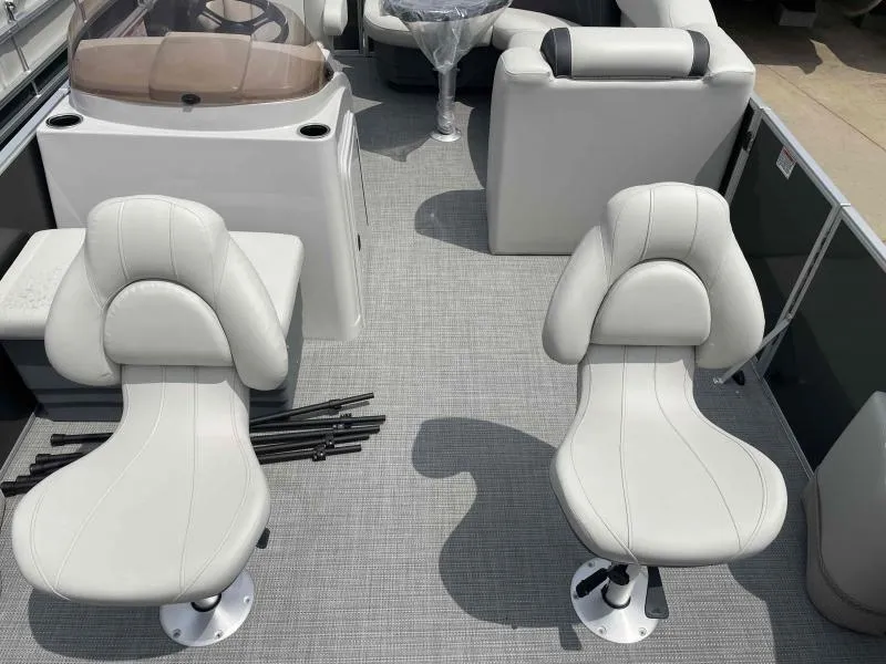 Slide: The Image of 2024 Sylvan Mirage 818 Fish boat interior with two swivel seats and modern design. - 6