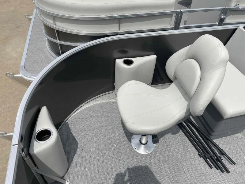 Slide: The Image of 2024 Sylvan Mirage 818 Fish boat interior with cushioned seating and cup holders. - 7