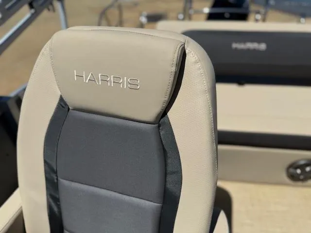 Slide: The Image of 2024 Harris HCX 25 Cruiser 250 boat seat, beige and gray upholstery. - 21