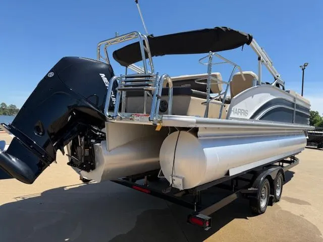 Slide: The Image of 2024 Harris Boats HCX 25 Cruiser 250 pontoon with Mercury outboard engine on trailer. - 8