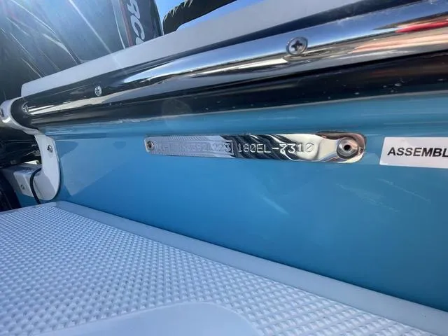 Slide: The Image of 2023 Bayliner E18 boat hull identification number plate. - 8