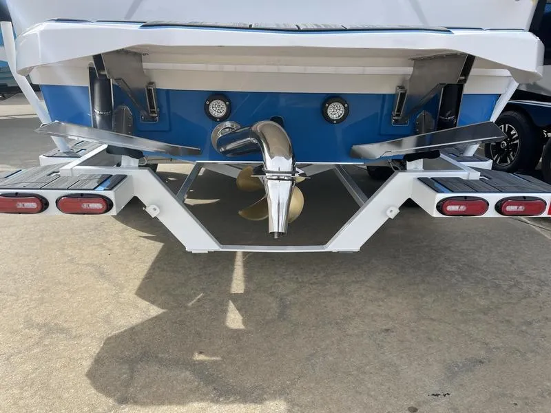 Slide: The Image of 2023 Supra SUPRA SA 450 boat stern with propeller and exhaust system. - 8