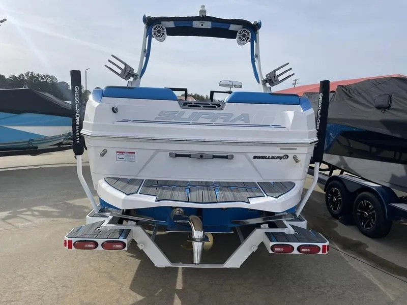 Slide: The Image of 2023 Supra SUPRA SA 450 boat, rear view, parked outdoors. - 9