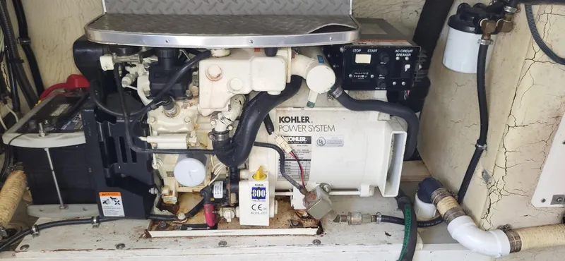 Slide: The Image of Engine compartment of a 2002 Formula 37 PC with Kohler power system. - 14