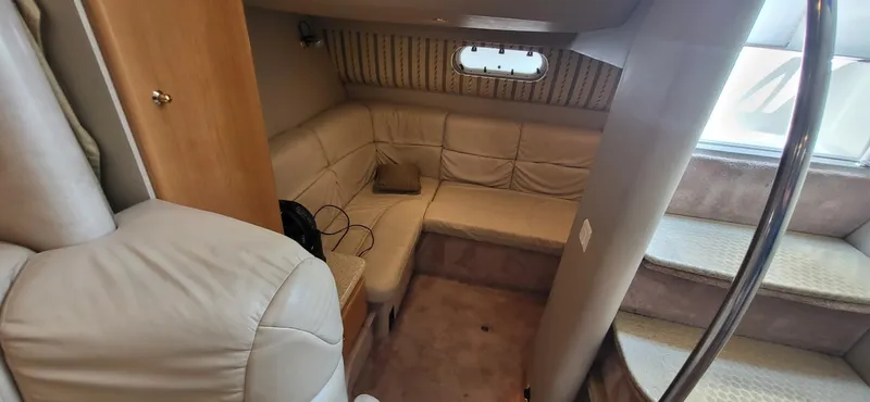 Slide: The Image of Interior of 2002 Formula 37 PC yacht with beige seating and steps. - 17